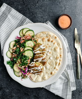 Photo of Herbed Falafel Platter with Fresh Veggies & Tahini