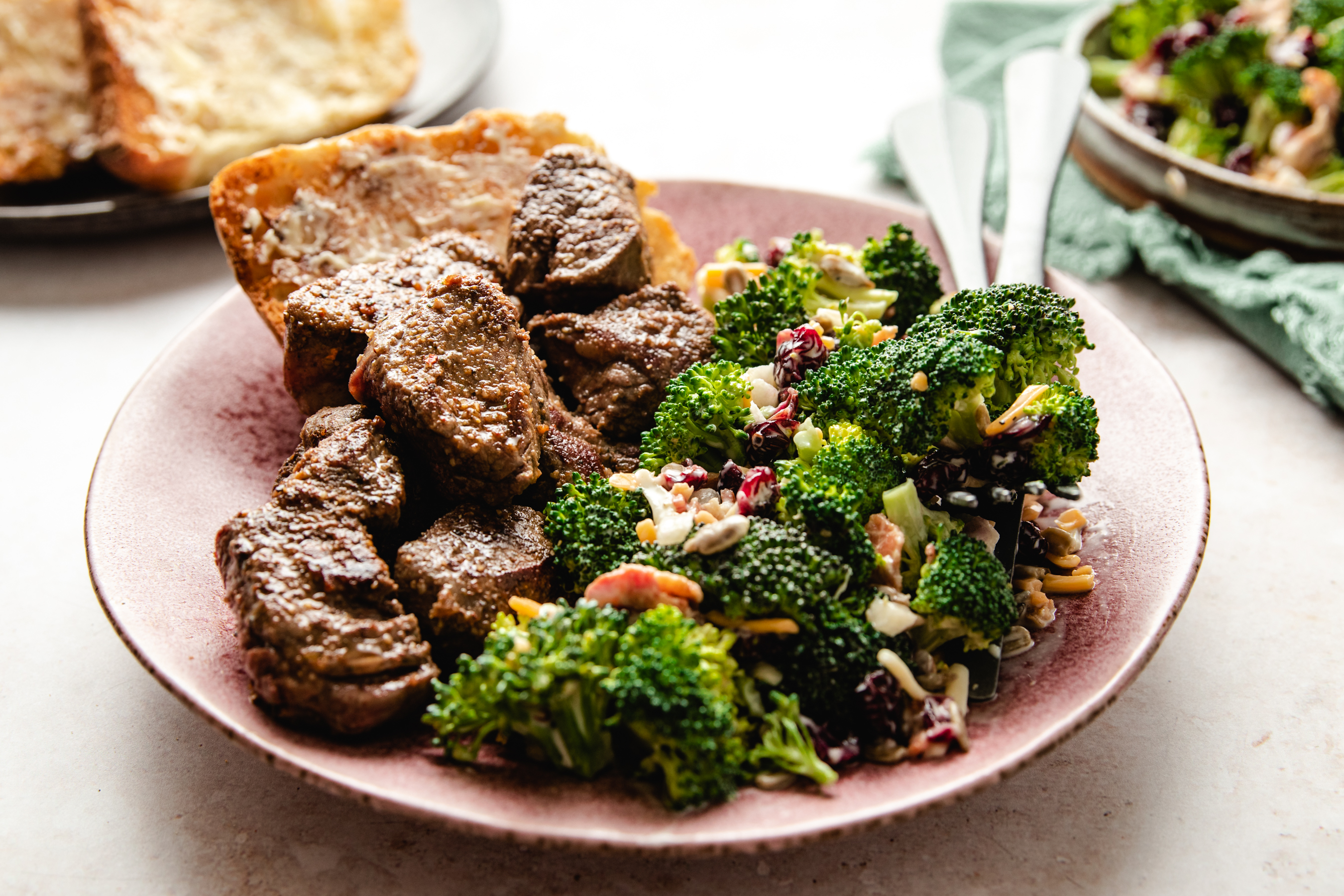 Photo of Tender Beef Tips with Garlic Bread & Cheddar Broccoli Salad