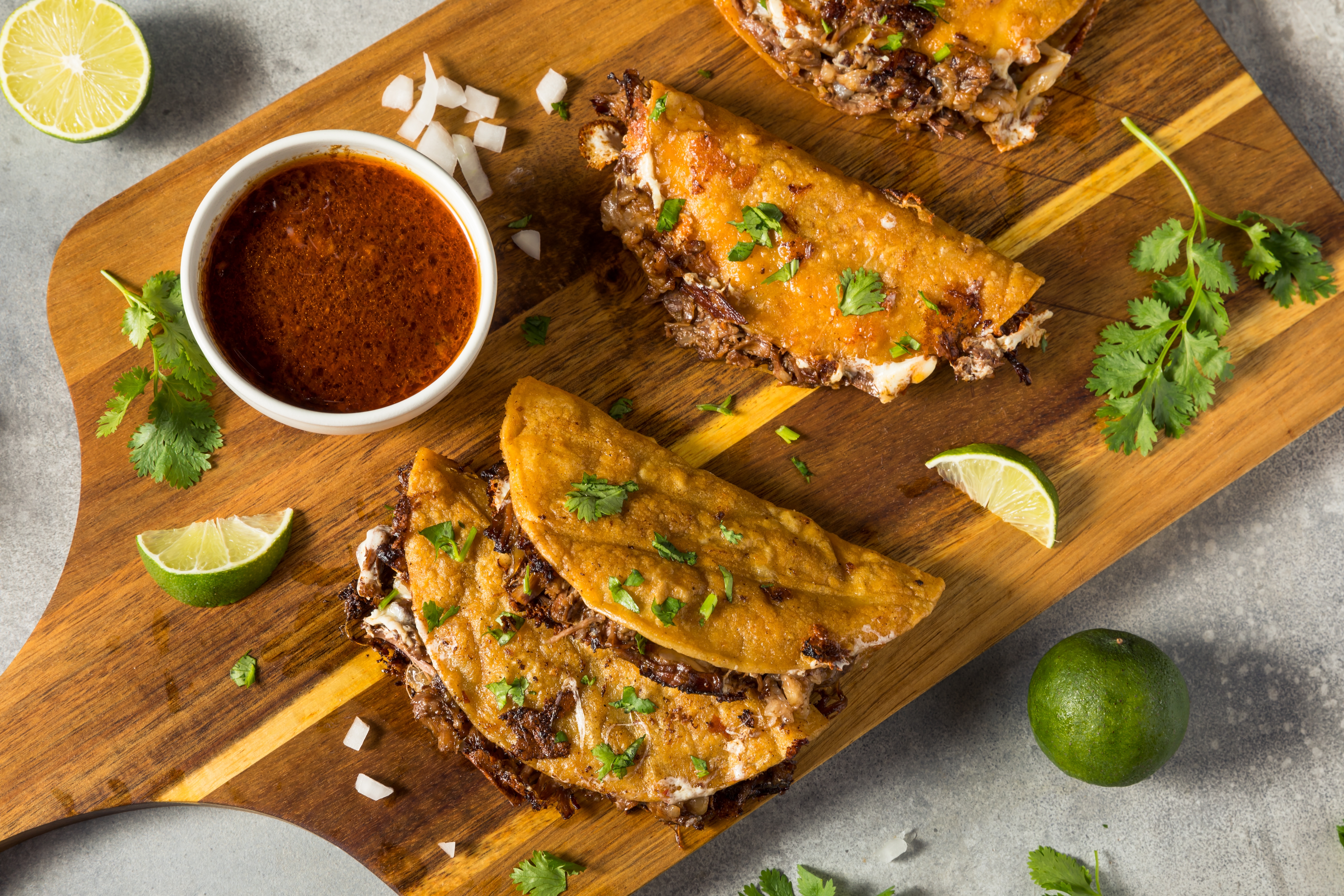 Photo of Quesabirria Tacos with Rich Dipping Broth